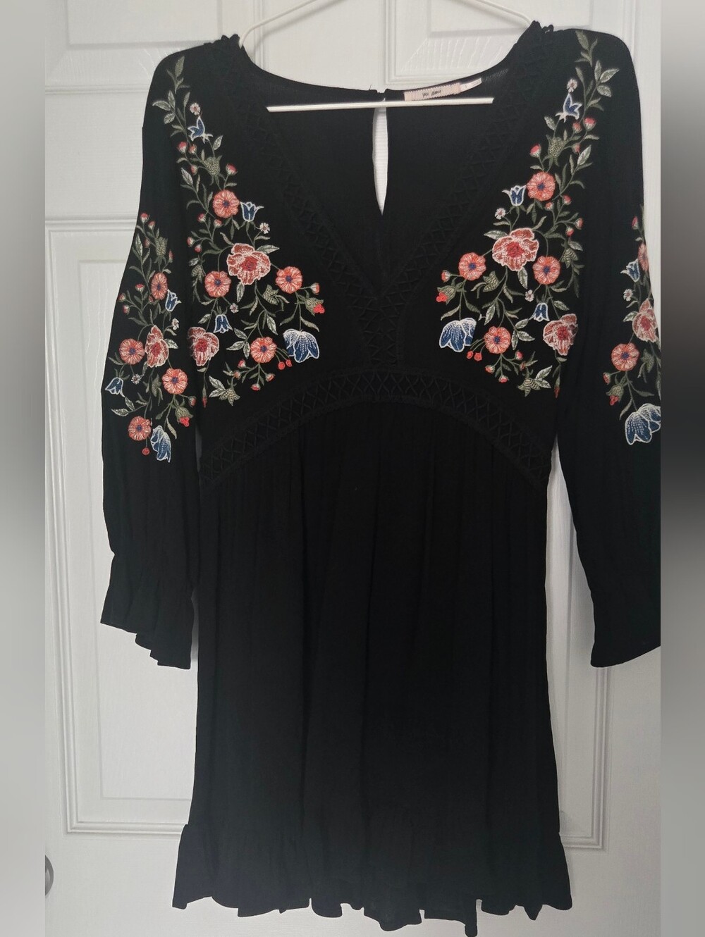Francesca's Black Embroidered V-Neck Tunic with Floral Accents